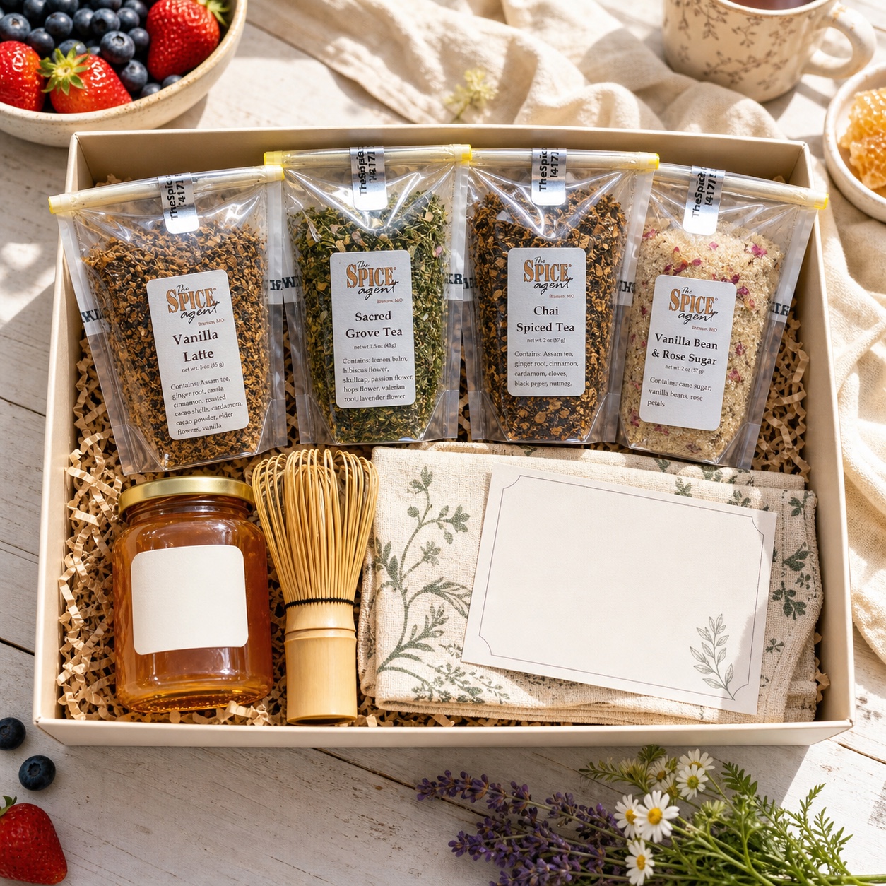Mother’s Day brunch and baking kit with Spice Agent pouches, honey, a whisk, berries, and flowers