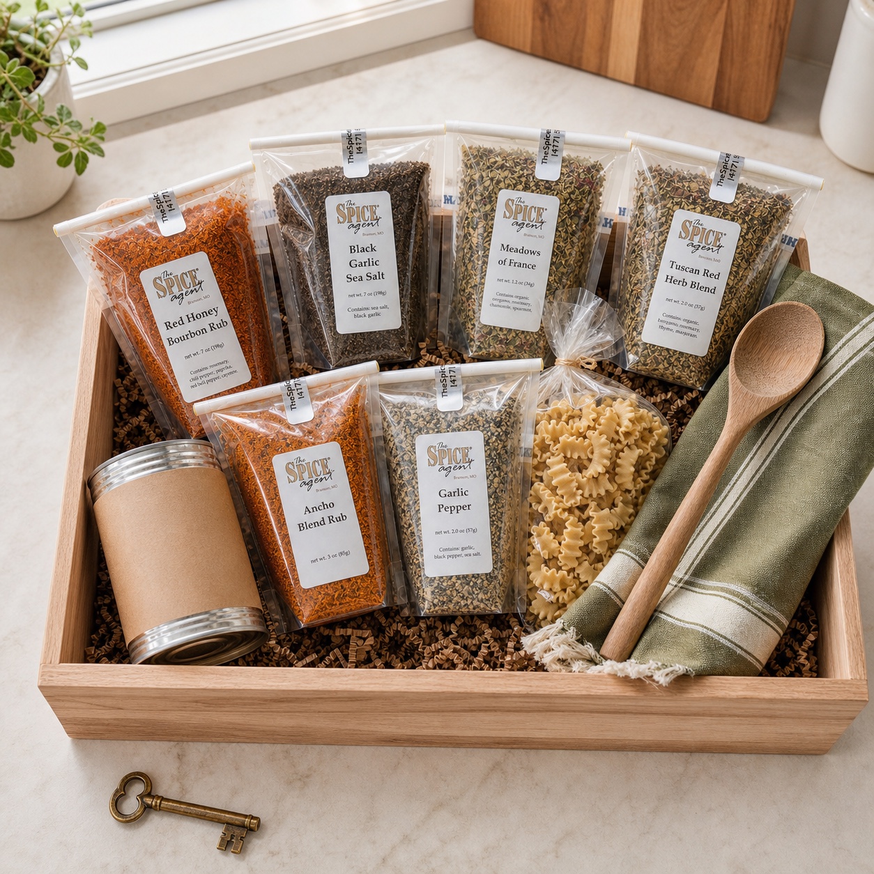 New home pantry rescue crate with Spice Agent pouches, pasta, tomatoes, and kitchen tools